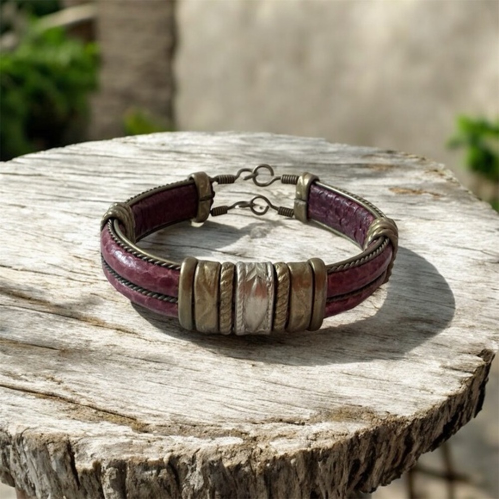 Stunning deep red leather cuff style bracelet with brass bands throughout